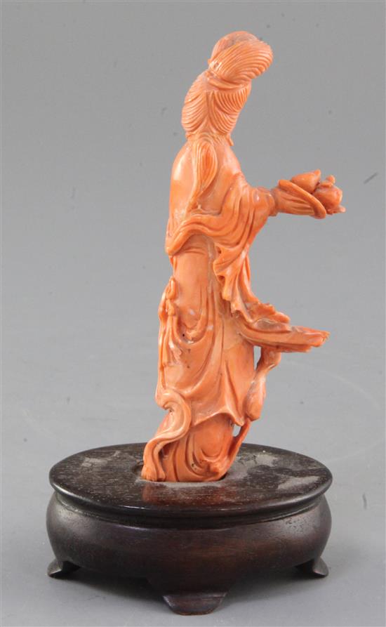 A Chinese carved coral figure of a lady, mid 20th century, total height 17.5cm